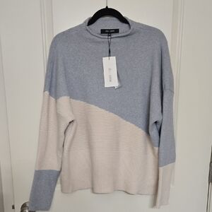 Elegant Two-Tone Turtleneck Sweater